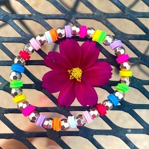 I am selling a clay bead bracelet that is homemade and fits all sizes!